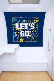 WVU’s nursing pod interior with text let's go on the wall